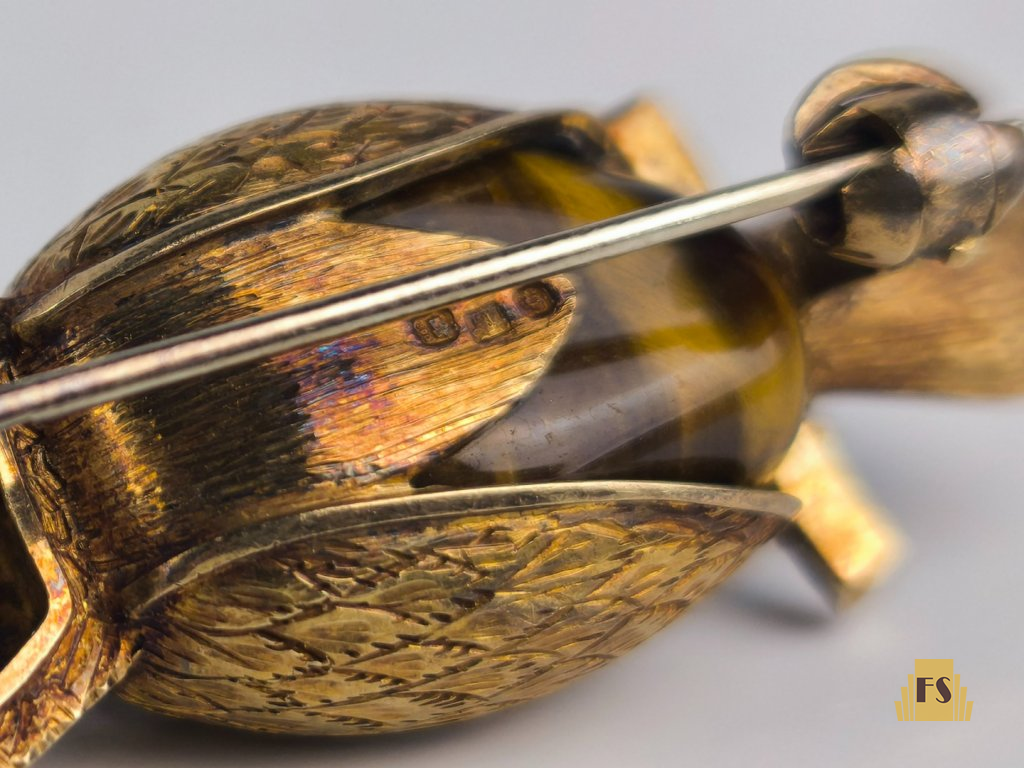 Alfinete de peito